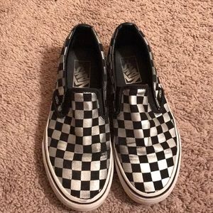 silver and black checkered vans